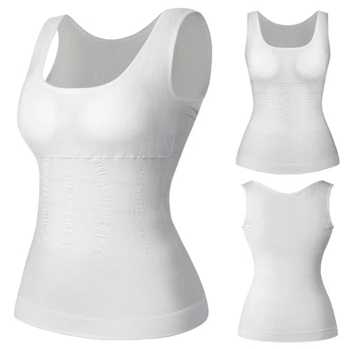 Woman wearing seamless white slimming body shaper tank top on the beach, showcasing tummy control shapewear with smooth fit and sculpting design
